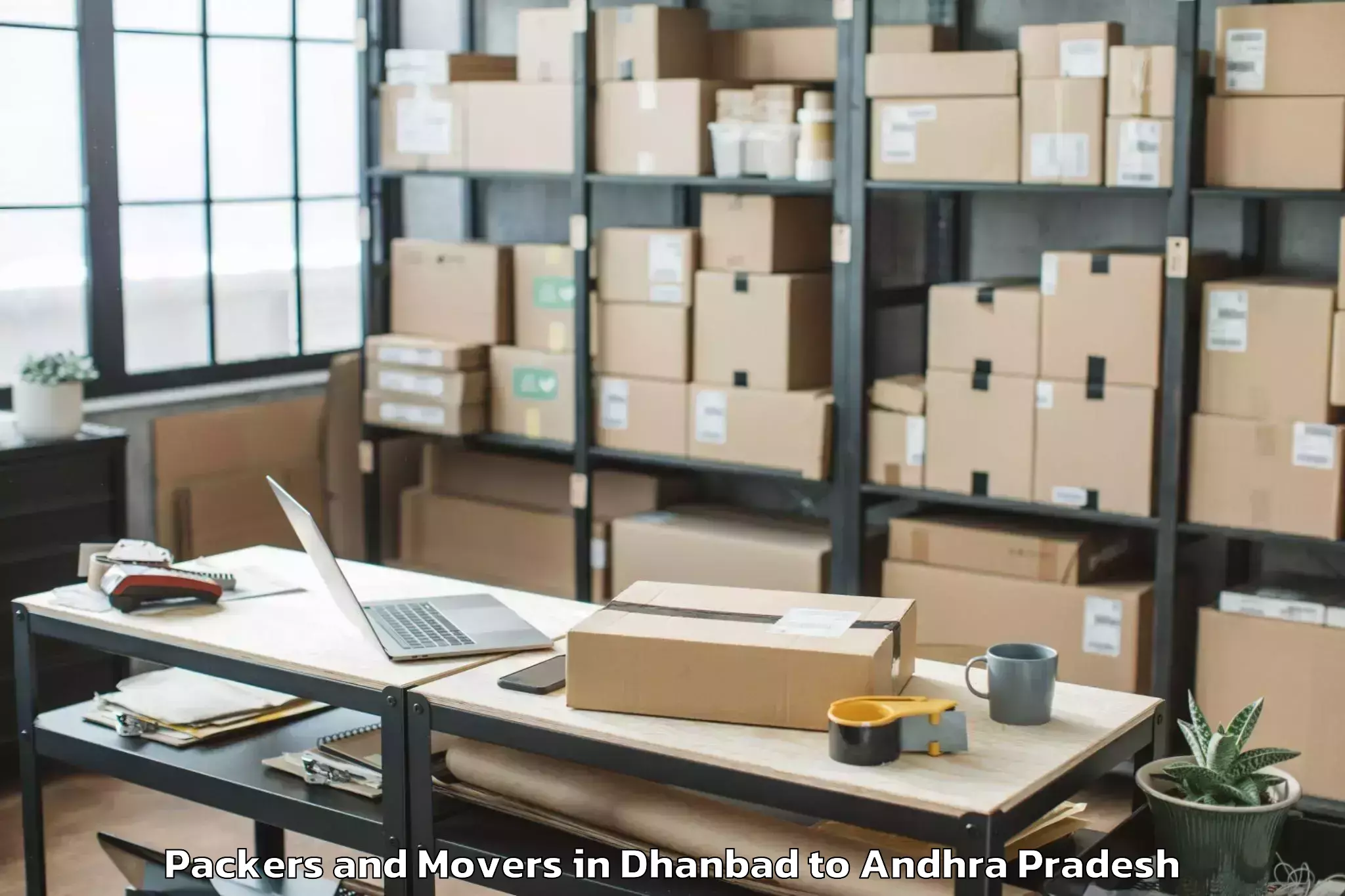 Dhanbad to Komarolu Packers And Movers